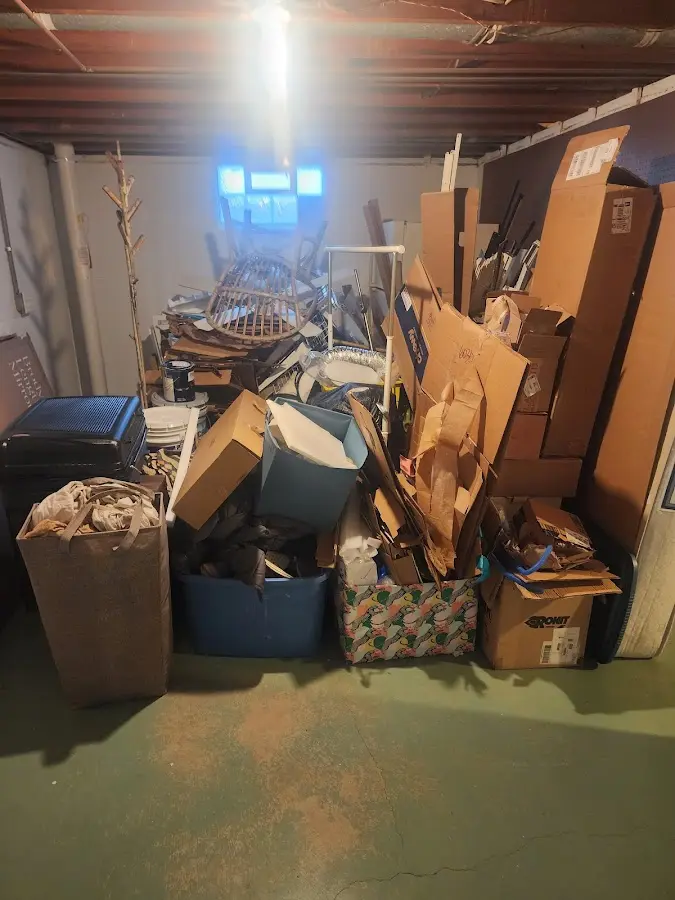 Roll-off dumpster container at job site for 4 Yard Dumpster Rental in Holbrook